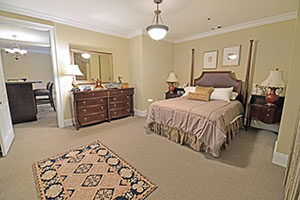 The Kirkwood, Monarch floor plan, offers a spacious master bedroom with an adjoining bathroom and walking closet.